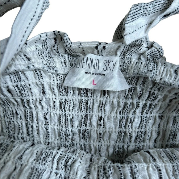 Sienna Sky | Smocked Romper - Picture 5 of 10